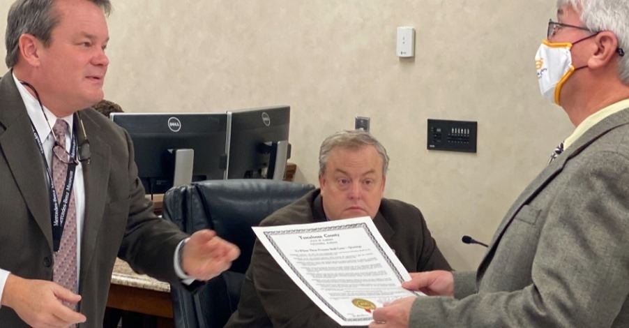 Probate Judge Rob Robertson presents proclamation to TCSS CTE Director Dennis Duncan Probate Judge Rob Robertson presents proclamation to TCSS CTE Director Dennis Duncan